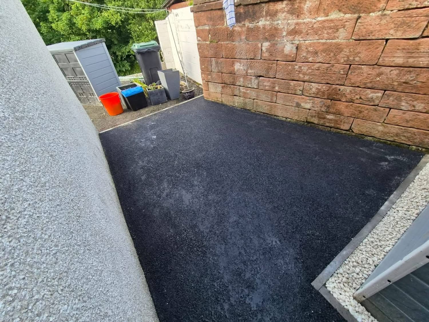 Completed tarmac path and rear area