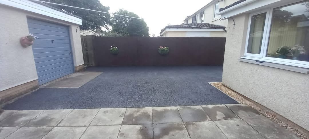 Finished rear garage tarmac area